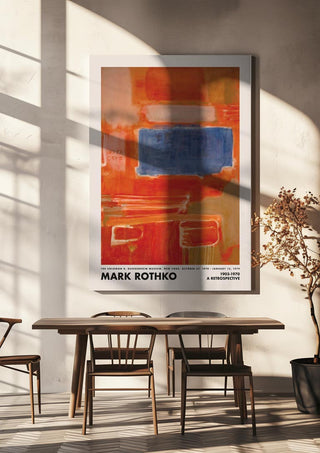 Rothko Blue Spot art print displayed on a wall above a dining table in a modern, sunlit room.