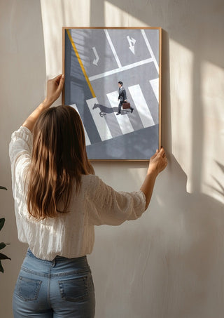 Dark horse by Jaron Su being hung on a sunlit wall