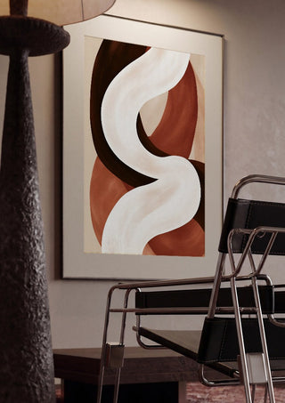 Curve in Cream by Martina Karlsson framed in a dim room beside a tubular steel chair