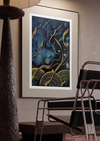 Gold Ribbons at Night by luco art framed in a dim room beside a tubular steel chair