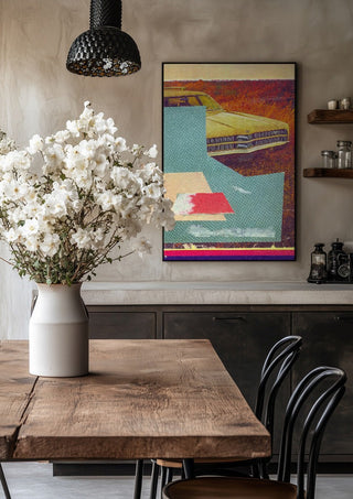 Station Wagon No.4 by Kareem Rizk in a black frame above a rustic table with white flowers