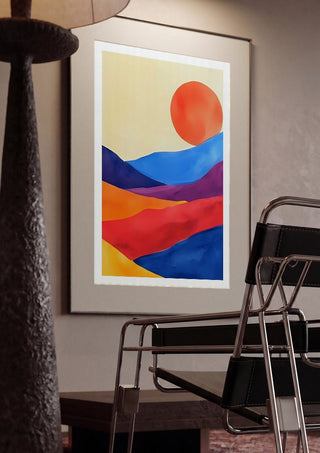 Red sun over colourful hills by Ohkimiko framed in a dim room beside a tubular steel chair