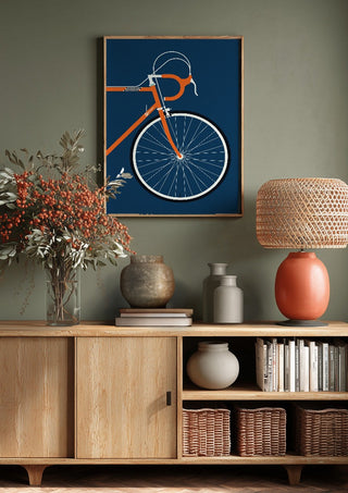 Swedish Racing Bike - Detail by Bo Lundberg above a wooden sideboard on a sage green wall
