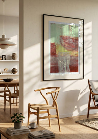 abstract layers and forms 1 by Iris Lehnhardt in a black frame in a bright dining room with wooden chairs