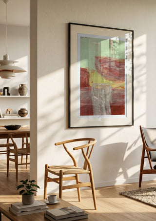 abstract layers and forms 1 by Iris Lehnhardt in a black frame in a bright dining room with wooden chairs