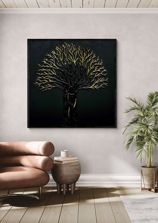 The Golden Tree by Marcel Herrmann in a black frame above a leather armchair beside a palm