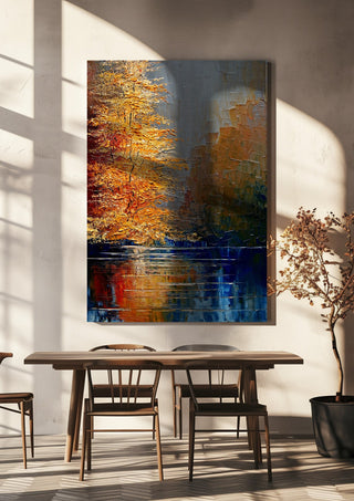 Autumn on the Water by Justyna Kopania hanging above a wooden dining table in warm sunlight