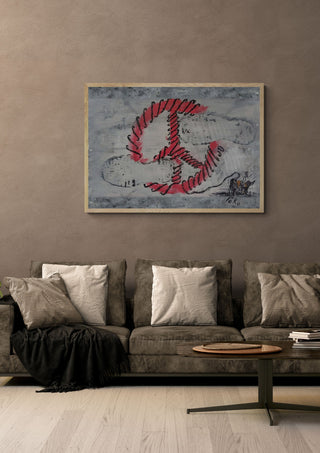 Peace that kills by PeKo in a light oak frame above a grey sofa on a warm brown wall