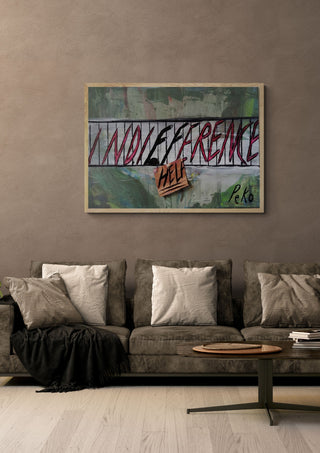Indifference kills by PeKo in a light oak frame above a grey sofa on a warm brown wall