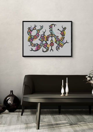 Pastel Glyphs by John Larkin in a black frame above a dark sofa with candlesticks on a round table