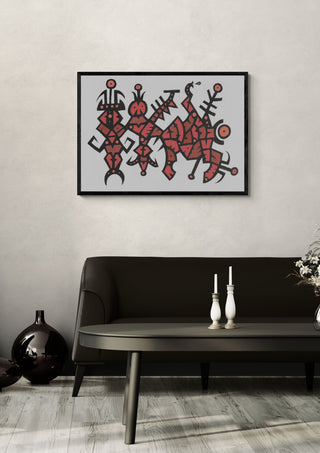 Red Totems by John Larkin in a black frame above a dark sofa with candlesticks on a round table