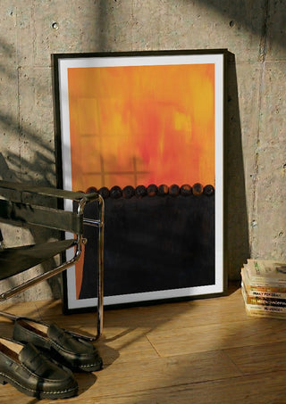 Das Licht in dir by Sophie Schillen in a black frame leaning against a concrete wall by a steel chair