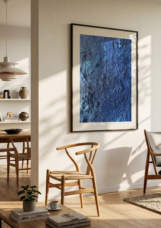 Das Meer by Sophie Schillen in a large black frame in a bright dining room
