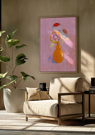 Flowers in an Orange Vase by Creationsbyeditabrus framed above a beige armchair beside a potted plant