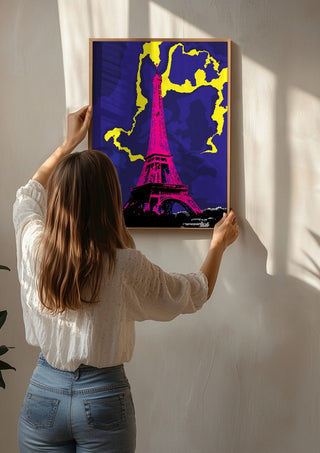 The Tower by Massimo Frascogna being hung on a sunlit wall