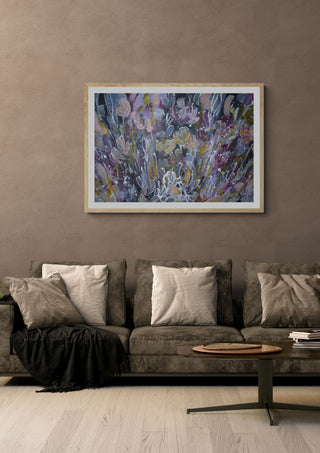 Euforia by Art Anne Lee in a light oak frame on a warm grey wall above a brown sofa