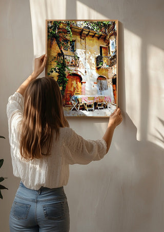 Italian courtyard by Massimo Frascogna being hung on a sunlit wall