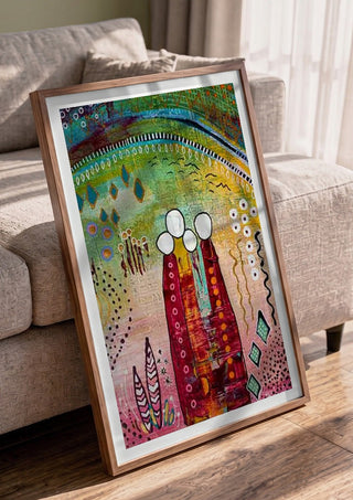 Fairy Tale 1 by Art Anne Lee in a walnut frame leaning against a grey sofa