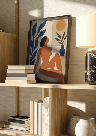 Matisse-Inspired Sunlit Muse by TimlessArtworks in a dark frame on a wooden shelf beside books and a lamp