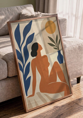 Matisse-Inspired Sunlit Muse by TimlessArtworks in a walnut frame leaning against a grey sofa