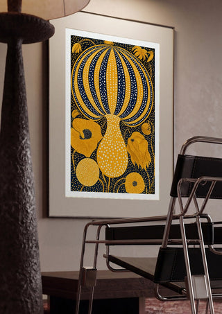 Yellow Dotted Pumpkin by Yokohama framed in a dim room beside a tubular steel chair