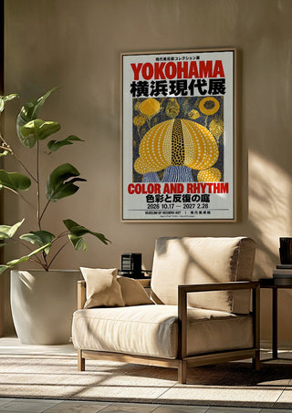 Color and Rhythm Poster by Yokohama framed above a beige armchair beside a potted plant