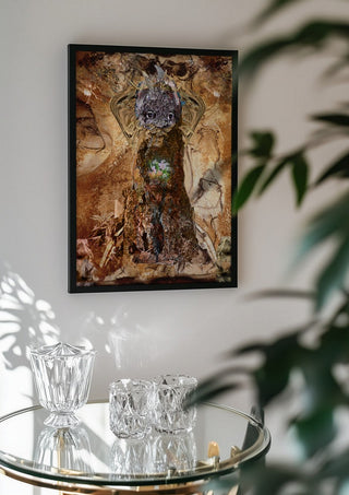 Tiden der var by Henrik Kock in a black frame above a glass table with crystal glassware