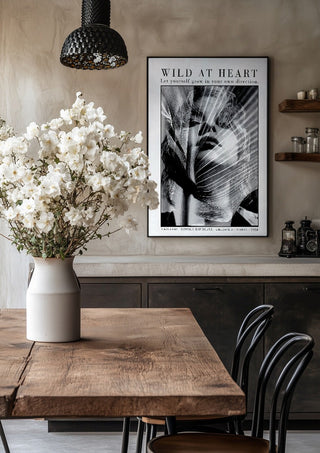 unleafed by hazelart in a black frame above a rustic table with white flowers