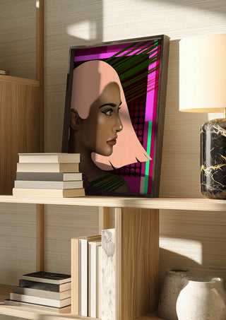 Electric Profile by Sabrina Rosenblatt in a dark frame on a wooden shelf beside books and a lamp
