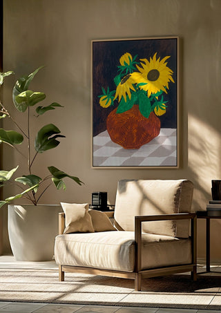 Gula blomster på rutig duk by Rebecka Hansson framed above a beige armchair beside a potted plant