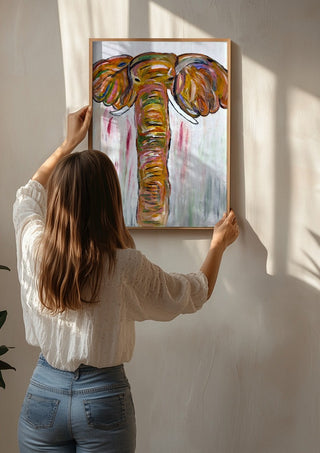 Chromatic Matriarch by Bibi being hung on a sunlit wall