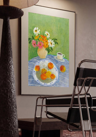 February Zinnias by Deblina Dey framed in a dim room beside a tubular steel chair
