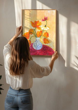 November Tulips by Deblina Dey being hung on a sunlit wall