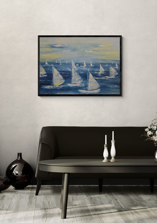 Sailing Free by Sabine Halbrock in a black frame above a dark sofa with white candlesticks