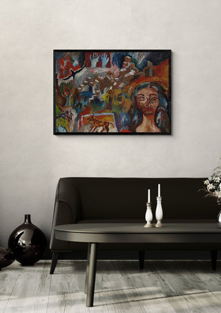 Torn between lovers by Will Black in a black frame above a dark sofa with white candlesticks