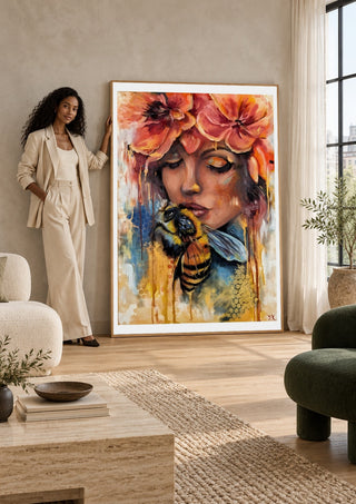 BeeYou by Elisa Kay held up by a woman in a bright living room