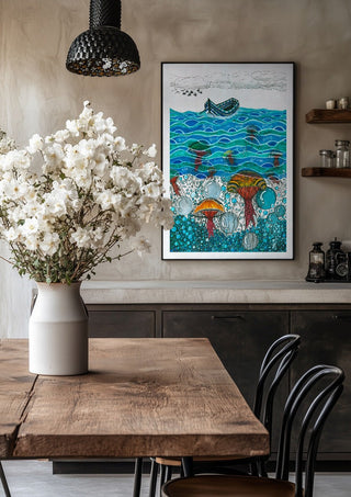 Jellyfish Sea by JHN.ByHjort in a black frame above a rustic table with white flowers
