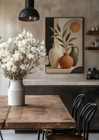 Terracotta Vase and Greenery by TimlessArtworks in a black frame above a rustic table with white flowers