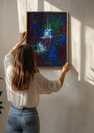 Trap by Zhan Snow being hung on a sunlit wall