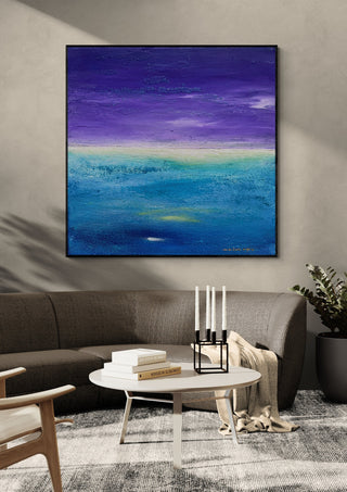 Fragment of Space by Marina Agre in a black frame above a grey sofa with candlesticks