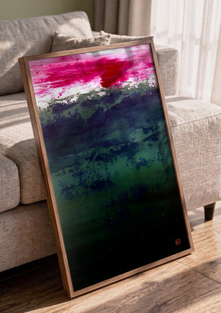 Emerald and Carmine by Marina Agre in a walnut frame leaning against a grey sofa