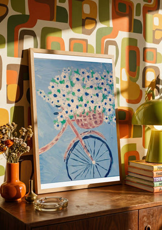 Whimsical Journey in White by Bibi in a wooden frame on a sideboard against retro patterned wallpaper