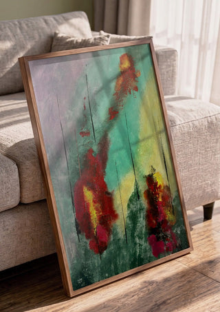 Smoke and Ember by Miguel Lemos in a walnut frame leaning against a grey sofa
