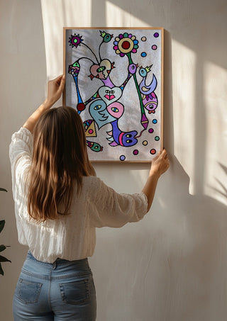 Hearts and Sunflower by Steffi Seiler being hung on a sunlit wall