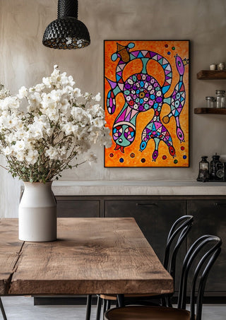 Circle of Eyes by Steffi Seiler in a black frame above a rustic table with white flowers