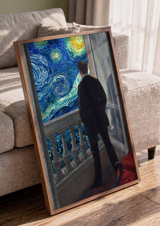 Starry Night by Dikhotomy in a walnut frame leaning against a grey sofa