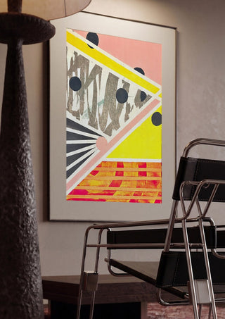 A favourite crossing by Vanyay framed in a dim room beside a tubular steel chair