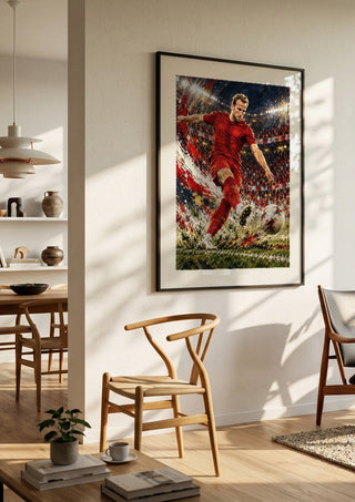 Harry Kane by Danii Steinfeldt in a black frame in a bright dining room with wooden chairs
