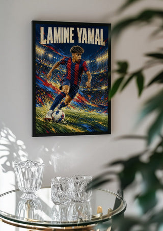 Lamine Yamal by Danii Steinfeldt in a black frame above a glass table with crystal glassware