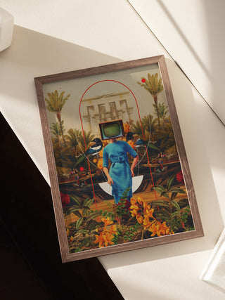 Framed artwork of a woman in blue with a TV for a head, surrounded by plants and geometric shapes.